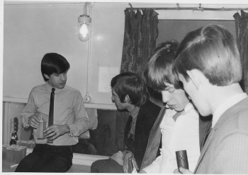 115 (L-R Unknown, Charlie Watts, Mick Jagger and Laurie Stead)